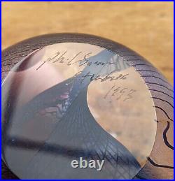 1993 Philabaum Iridescent Art Glass Paperweight Abstract Cutaway Purple Round