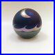Signed-Correia-art-glass-paperweight-deep-iridescent-blue-with-metallic-moon-01-fcaw
