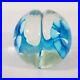 Unique-Art-Glass-Paperweight-withTwo-Lobes-Each-Containing-a-Blue-Flower-Shape-01-yrqj